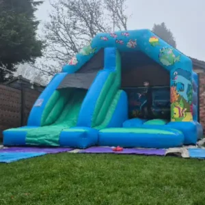 front combo bouncy castles with a slide fish under the sea
